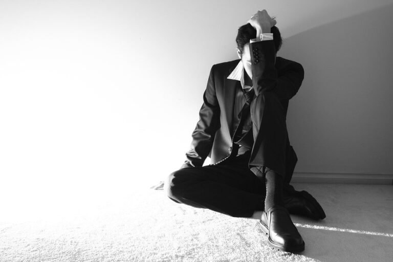 A business man is distraught and struggling with his meth addiction and its effects.