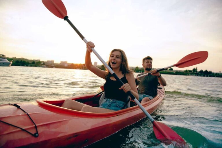A group of friends kayaking instead of drinking at the bar on St. Patrick’s Day.